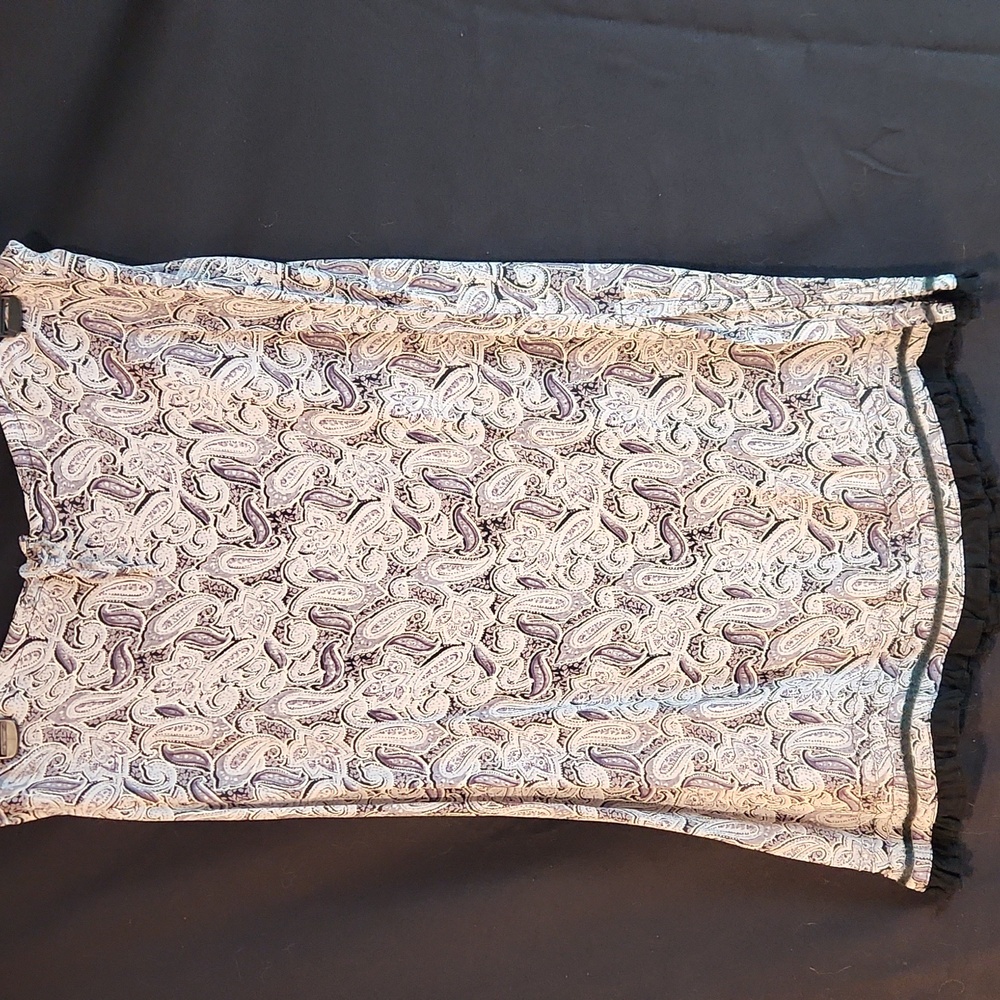 Angie brand paisley print flowy rayon skirt. Size Small with split on each side.